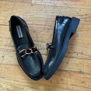 Steve Madden Glossy Black Loafers with Gold Chain